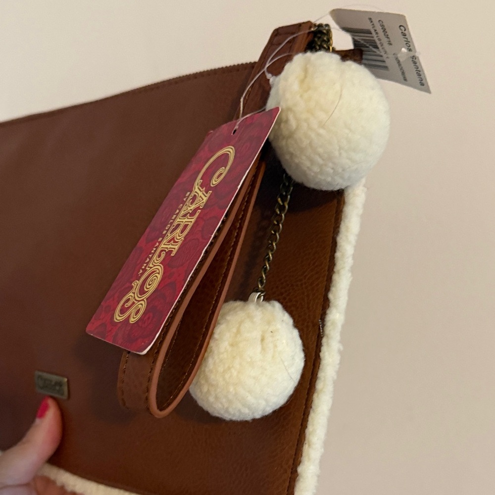 Carlos Santana Tan and Cream Clutch